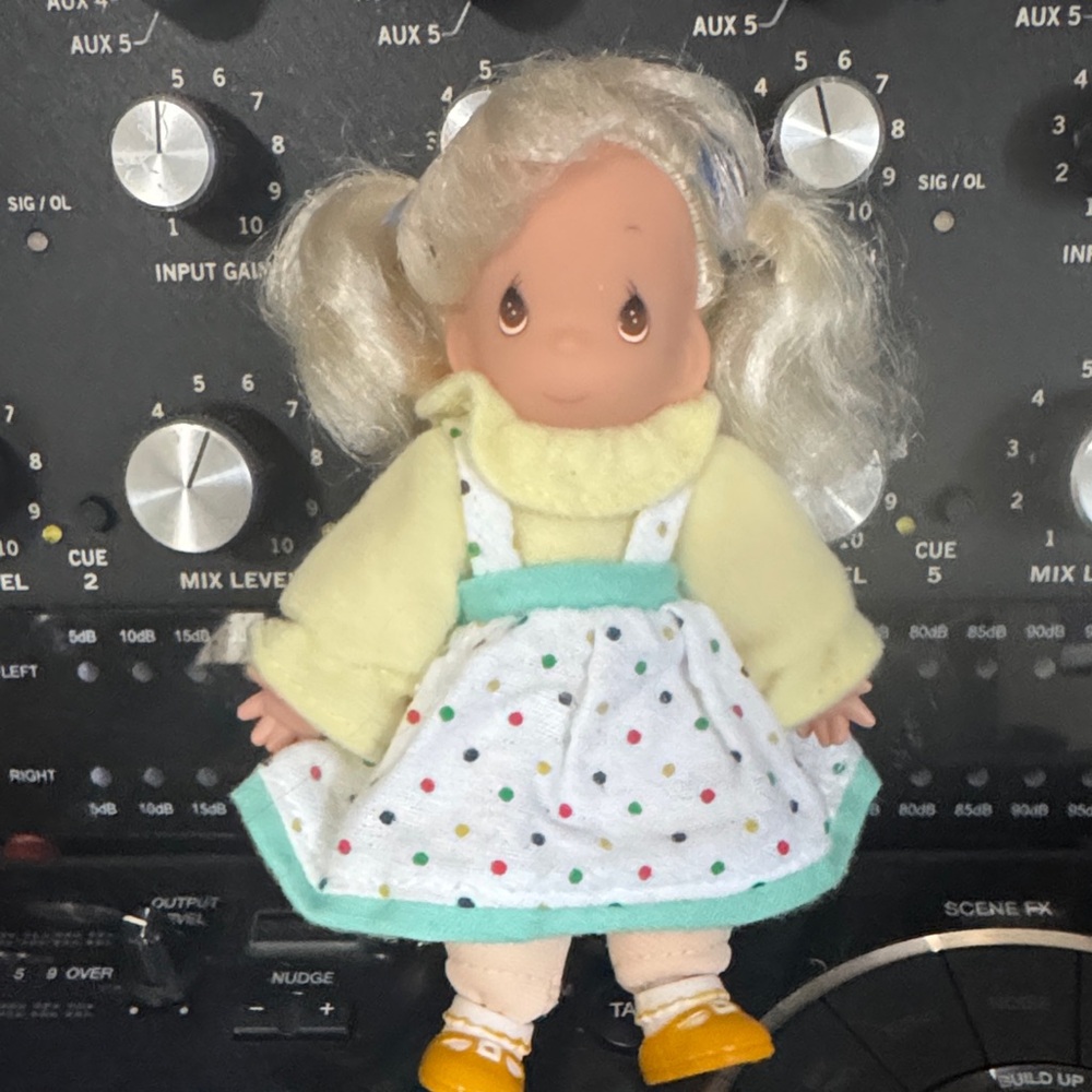 Precious Moments Doll with Yellow and Polka Dot Dress